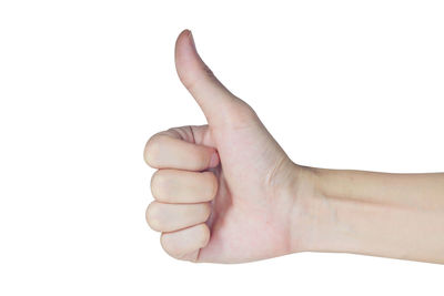 Close-up of human hand against white background