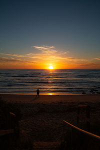 Scenic view of sunset over sea