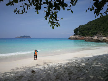 Girl walking at beach