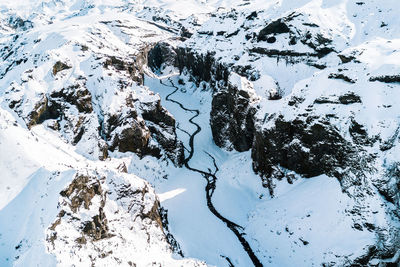 High angle view of snowcapped mountains during winter