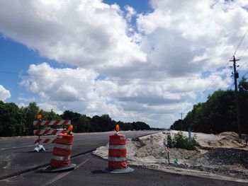 View of road against cloudy sky