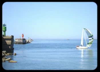 Boat sailing in sea