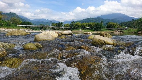 Scenic view of river against sky