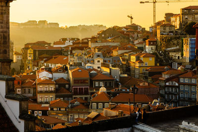 High angle view of townscape against sky at sunset