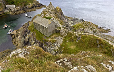 High angle view of rocks in sea