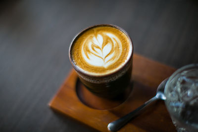 Close-up of cappuccino on table