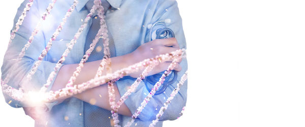 Close-up of woman against white background