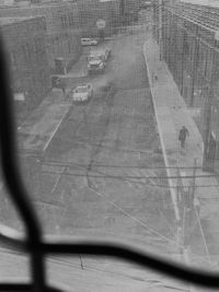 Close-up of road seen through window