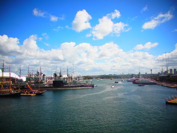 Boats moored at harbor