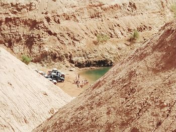 High angle view of people on rock formation
