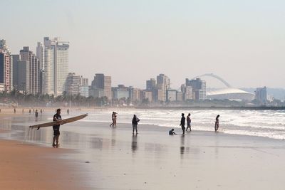 City skyline with sea in background