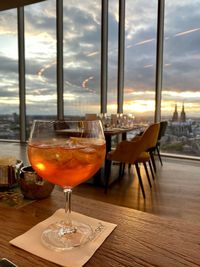 Wine glass on table at restaurant