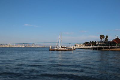 View of built structures against blue sky