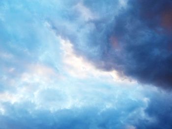 Low angle view of clouds in blue sky