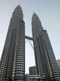 Low angle view of skyscrapers against sky