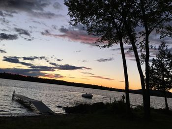 Silhouette of boat at sunset