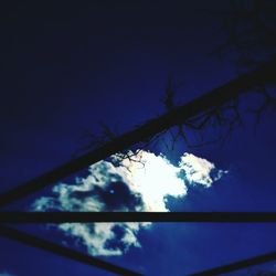 Low angle view of silhouette tree against sky