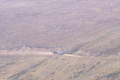 High angle view of road amidst land