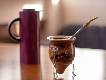 Close-up of container on table