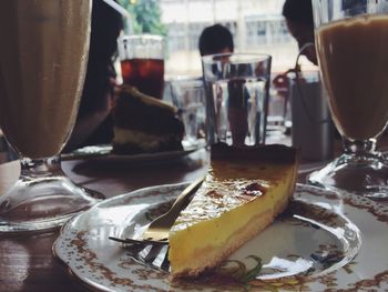 Close-up of cake and tea on table