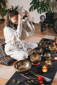 High angle view of mother and daughter at home