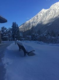 Scenic view of snow field against clear sky