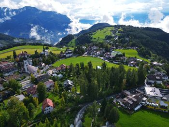 High angle view of trees and houses against sky