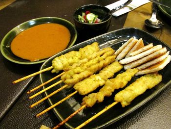 Close-up of meat on barbecue grill