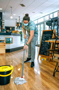 Man standing on hardwood floor