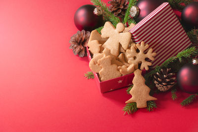 High angle view of cookies with christmas decoration on table