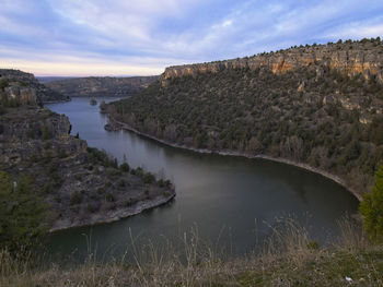 Scenic view of river against sky
