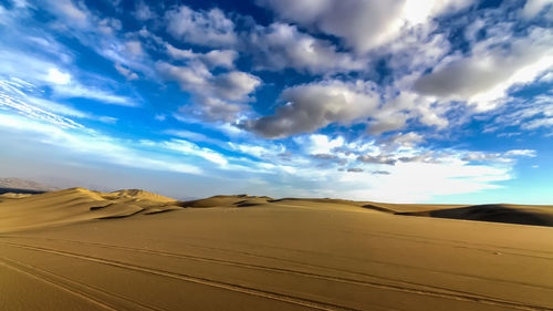 Scenic view of desert against sky