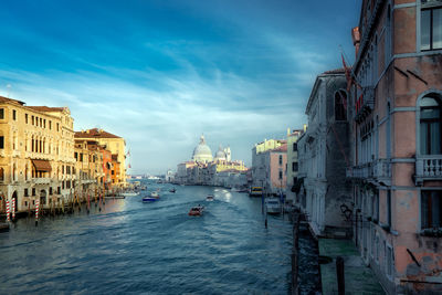 Canal passing through city buildings