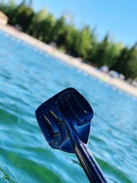 Close-up of black boat on lake