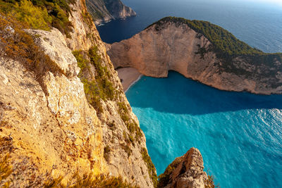 High angle view of rocks in sea