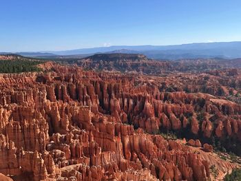 Aerial view of rock formations against sky