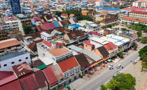 High angle view of street amidst buildings in city