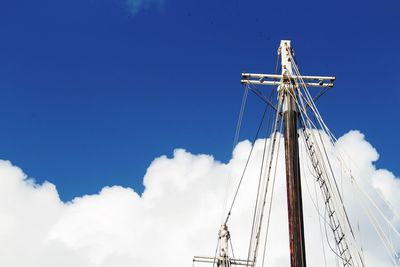 Low angle view of building against blue sky