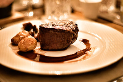 Close-up of chocolate cake in plate on table