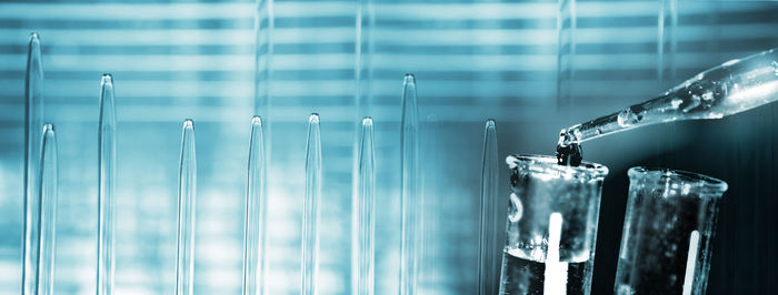 Close-up of glass with reflection of water