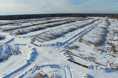 High angle view of snow covered landscape against sky