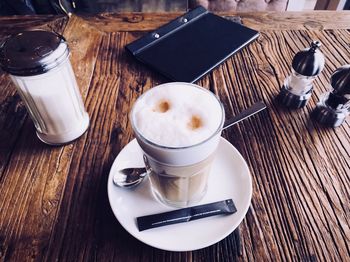 High angle view of coffee cups on table