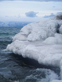 Scenic view of frozen sea against sky