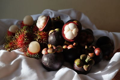 High angle view of fruits in plate on table