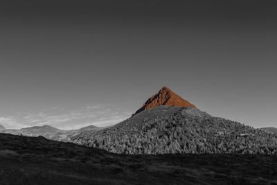 Color isolation effect on top of a volcano-shaped mountain, col quaterna, dolomites, veneto, italy