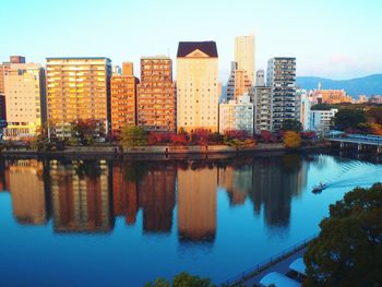 Buildings in city at dusk