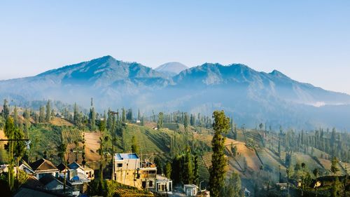 Panoramic shot of townscape against mountain range