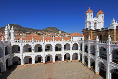 View of historic building against clear blue sky