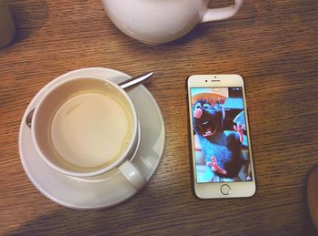 Directly above shot of coffee cup on table
