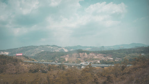 Aerial view of townscape against sky